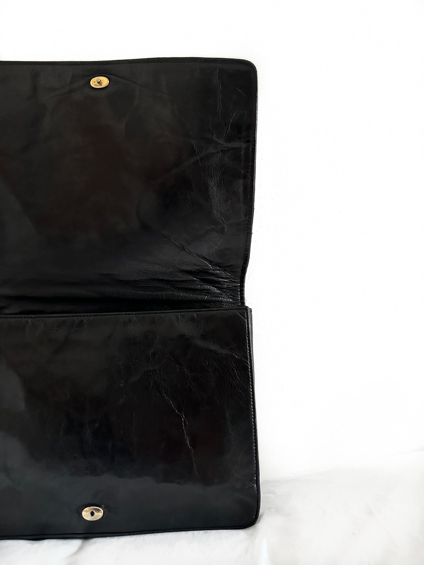 YSL black leather clutch