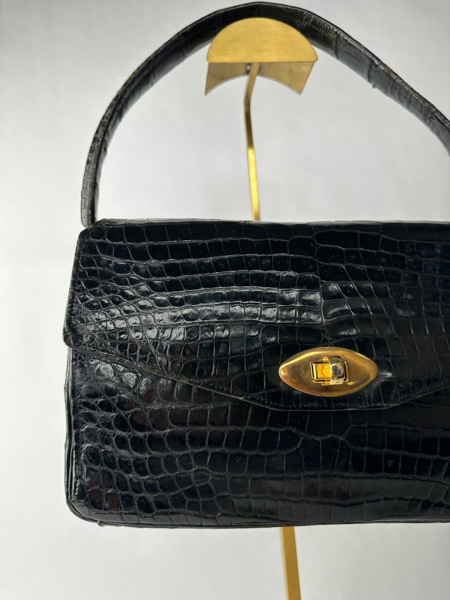 ANONYMOUS black exotic leather bag with shoulder strap and gold buckle