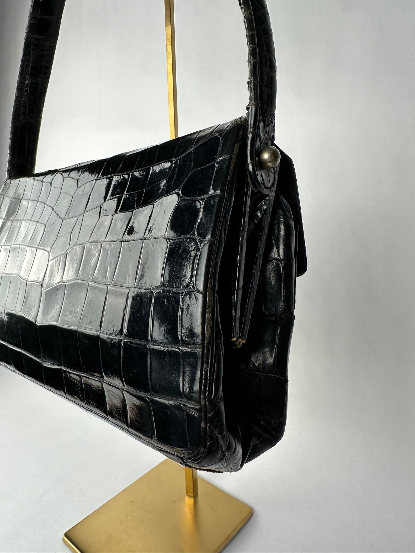 ANONYMOUS black exotic leather bag with shoulder strap and gold buckle