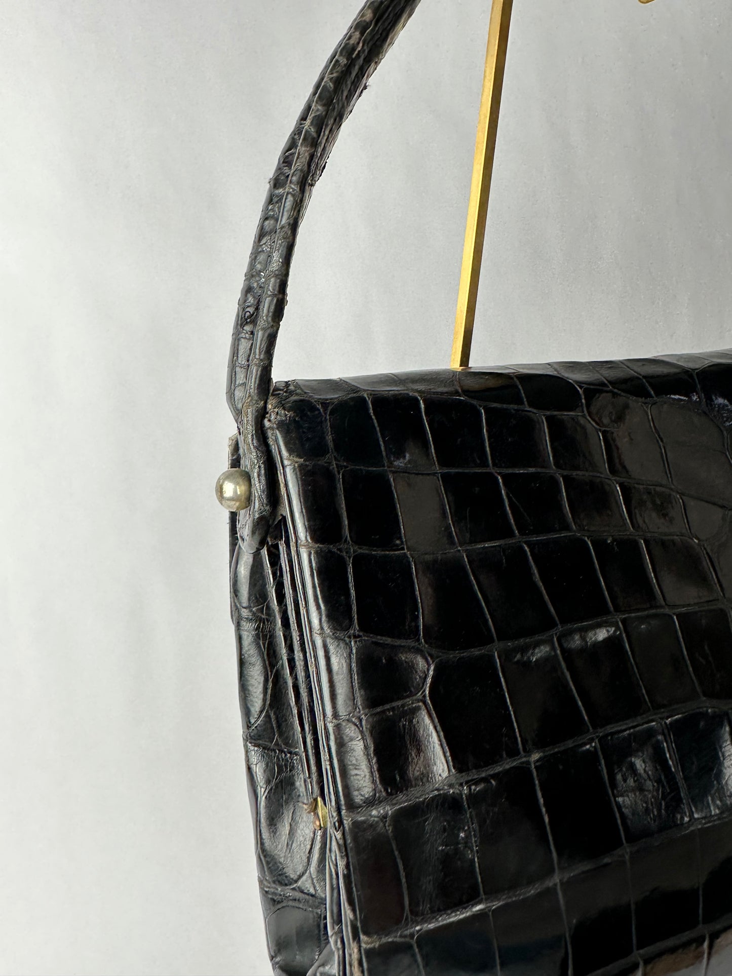 ANONYMOUS black exotic leather bag with shoulder strap and gold buckle