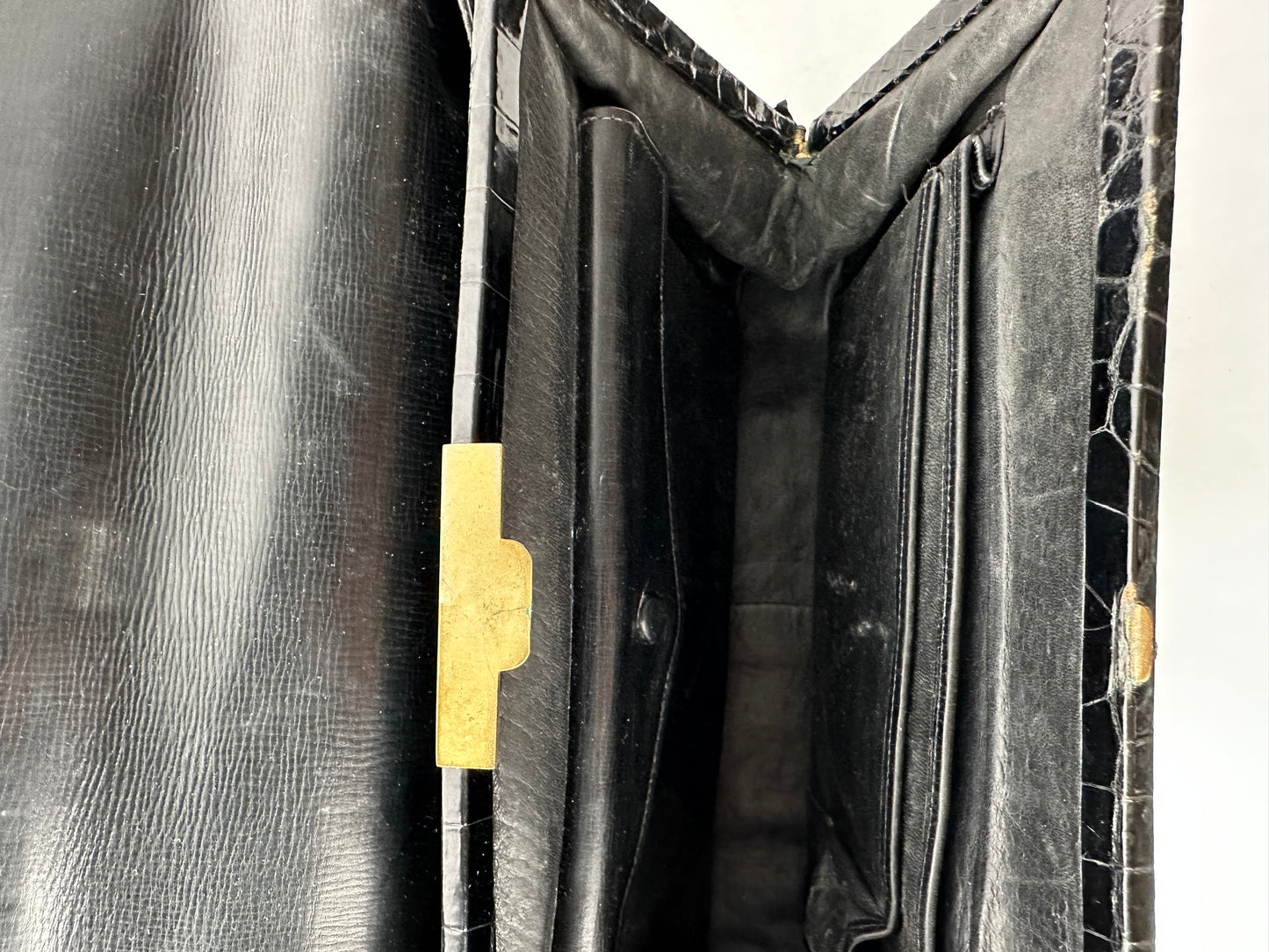 ANONYMOUS black exotic leather bag with shoulder strap and gold buckle