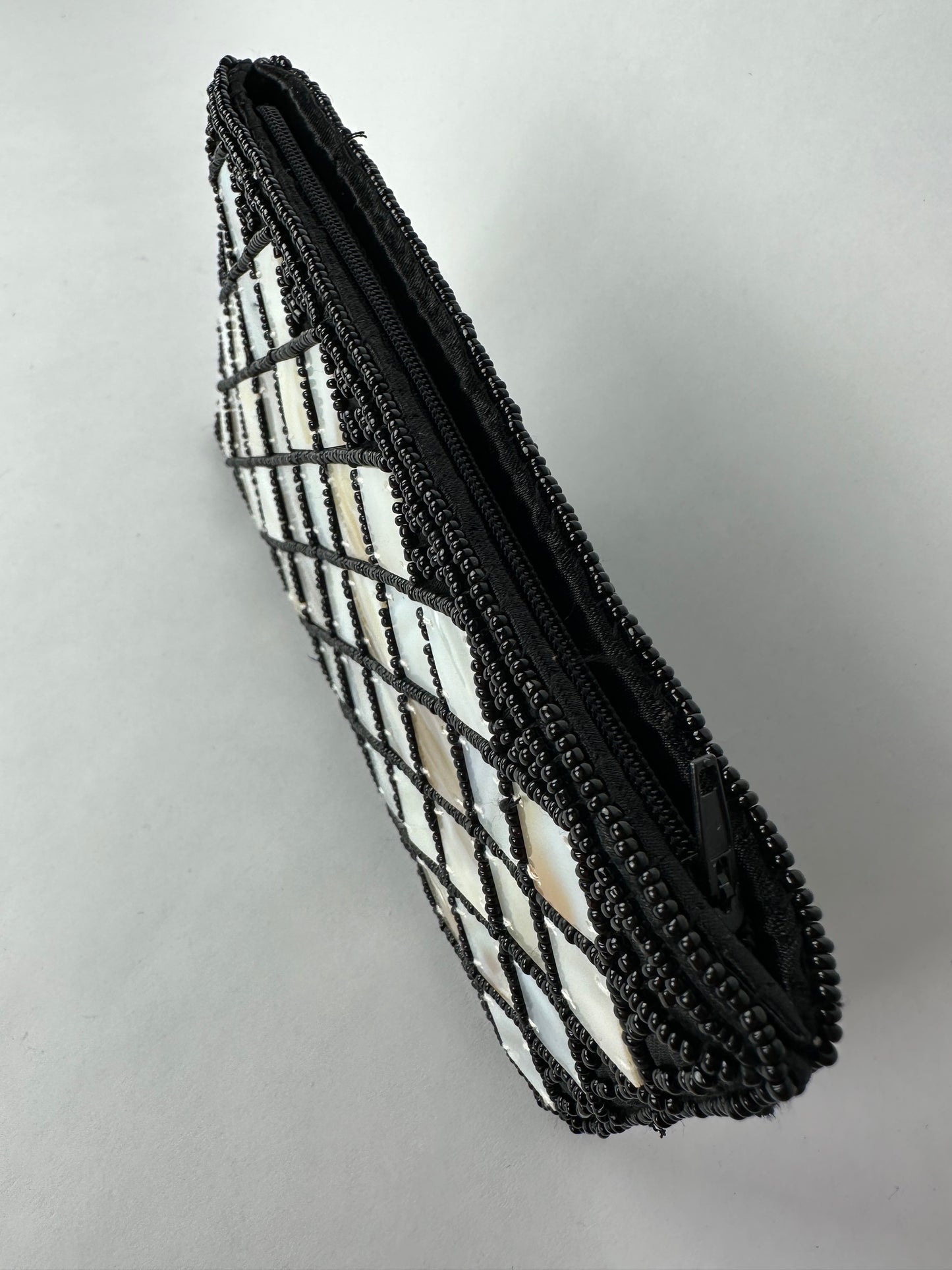 ANONYMOUS money pouch beaded with mother of pearl
