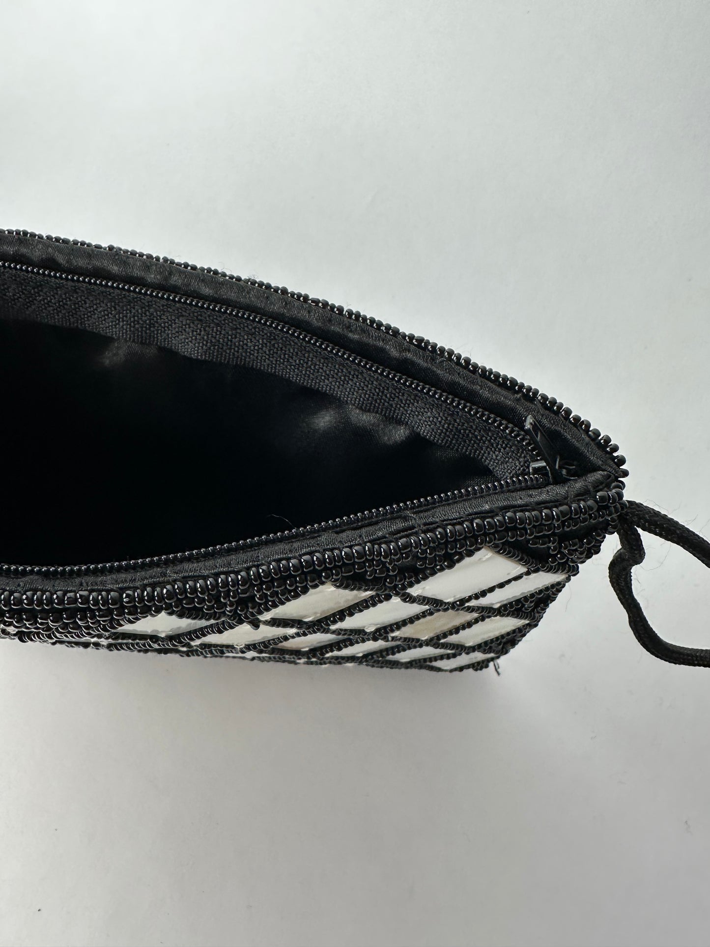 ANONYMOUS money pouch beaded with mother of pearl