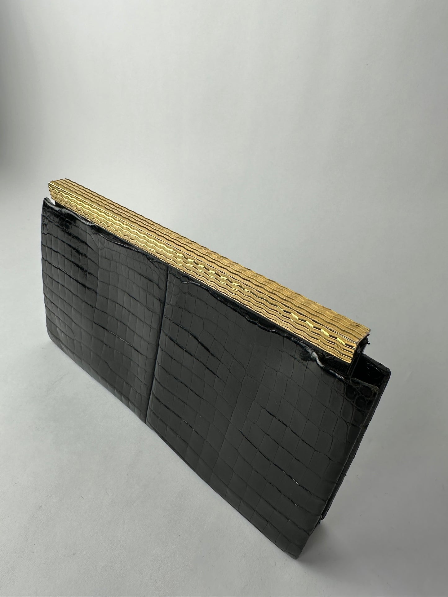 ANONYMOUS black exotic leather clutch bag with gold-plated metal clasp