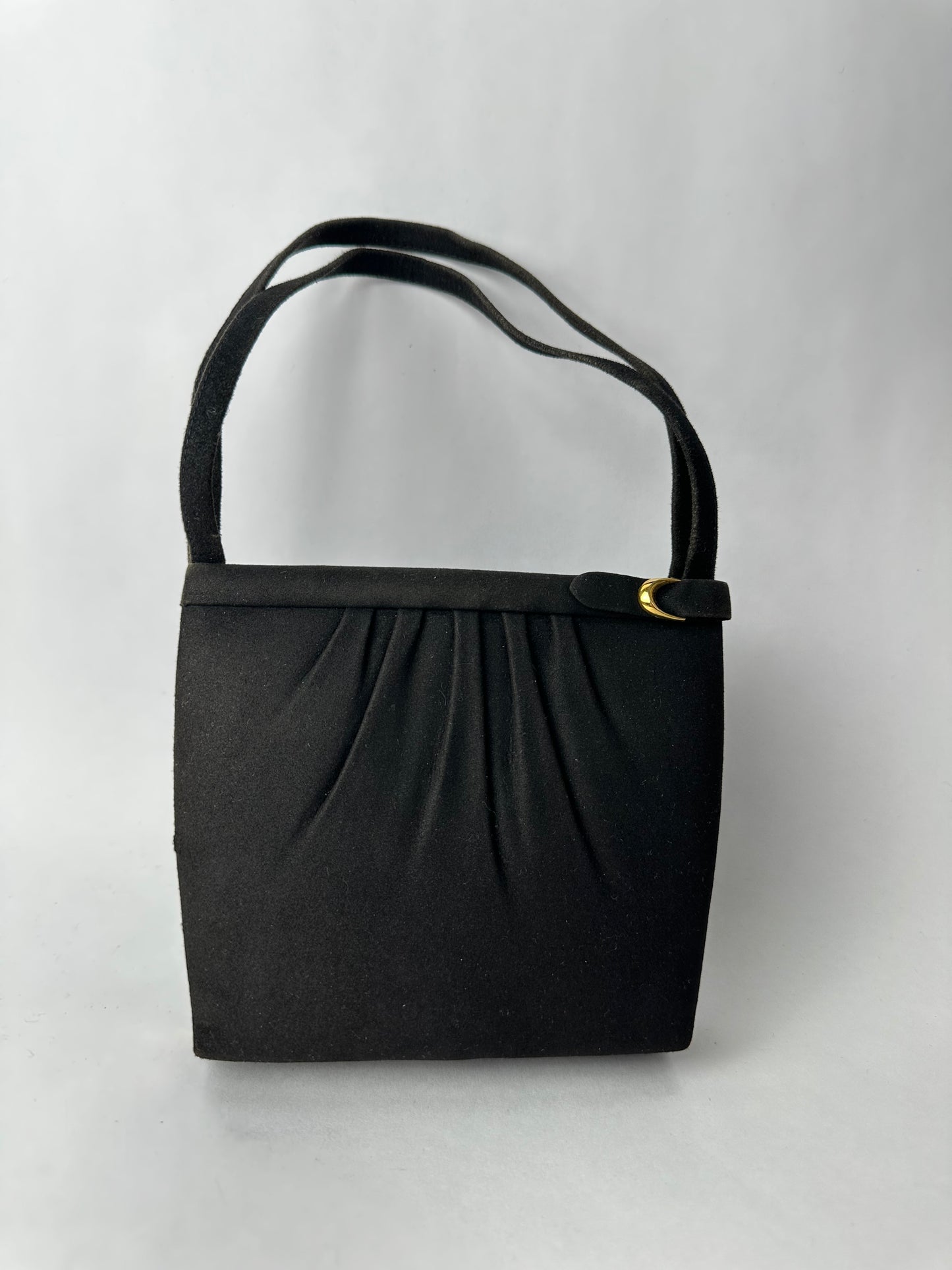 ANONYMOUS black suede with golden poudrier