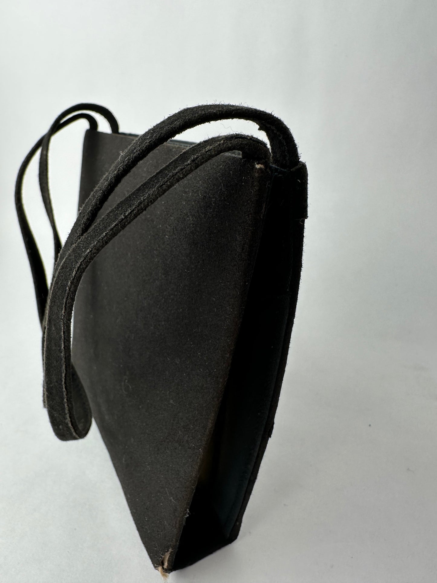 ANONYMOUS black suede with golden poudrier