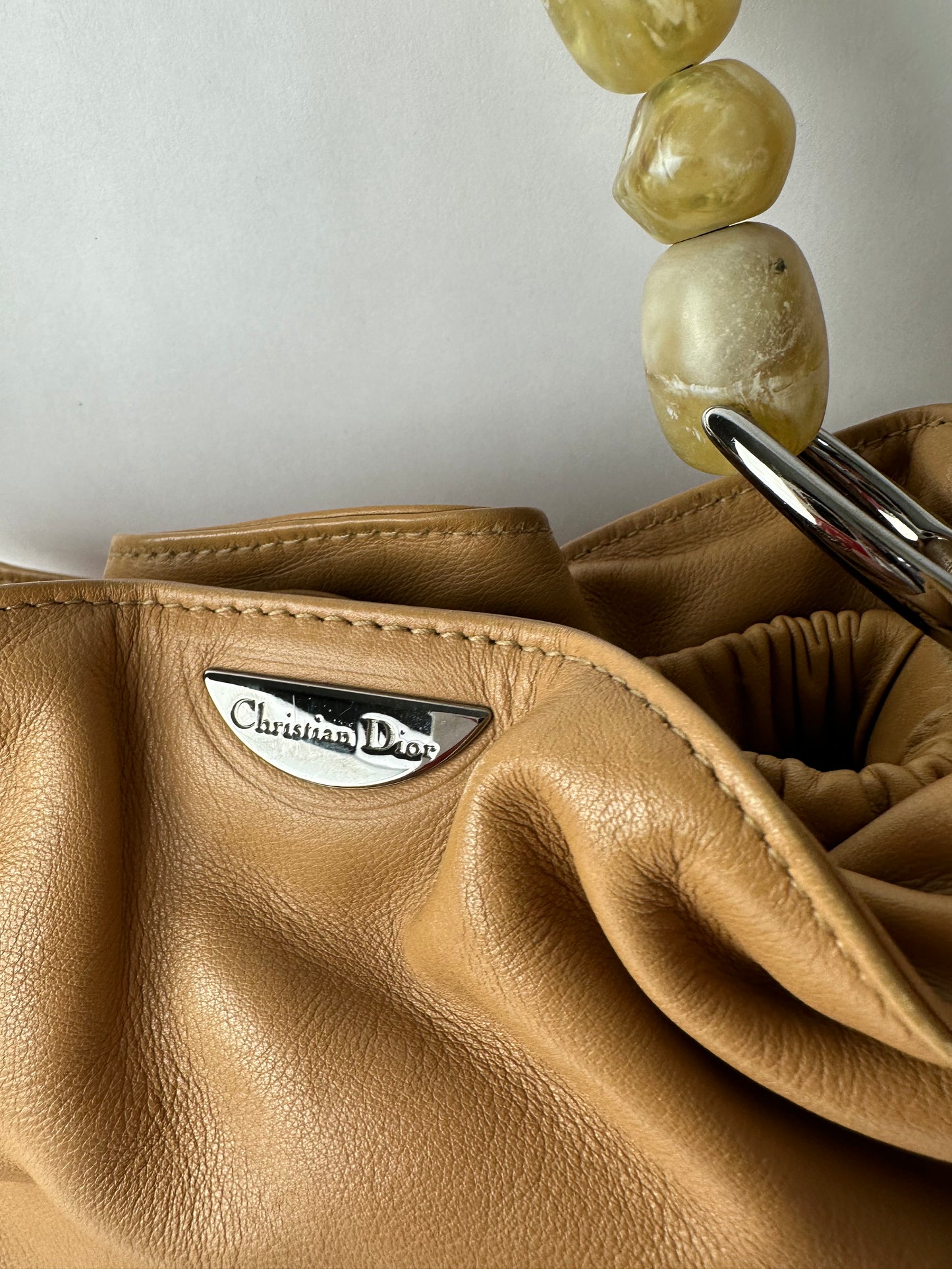 CHRISTIAN DIOR small malice bag in beige gathered leather, marbled resin beads