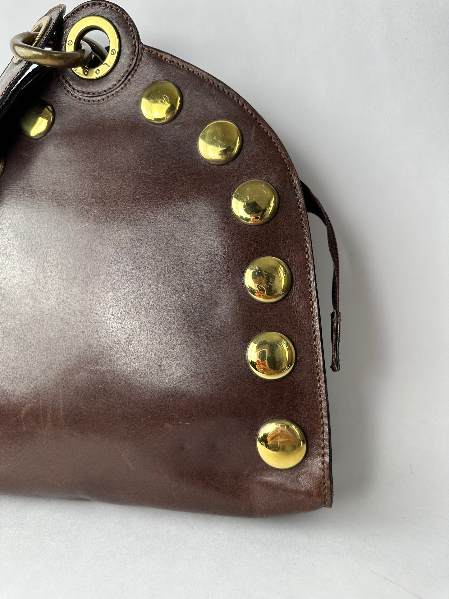 ANONYMOUS brown leather and gold stud bag