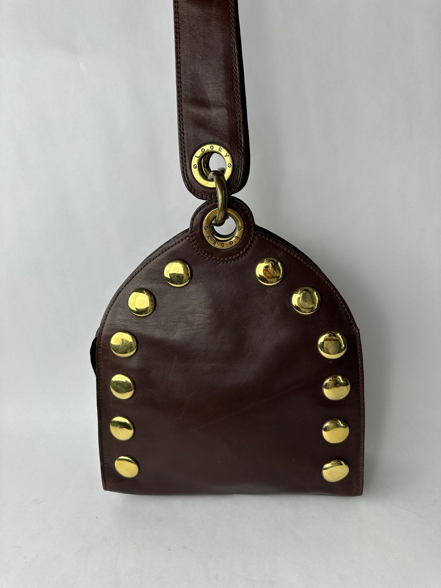 ANONYMOUS brown leather and gold stud bag