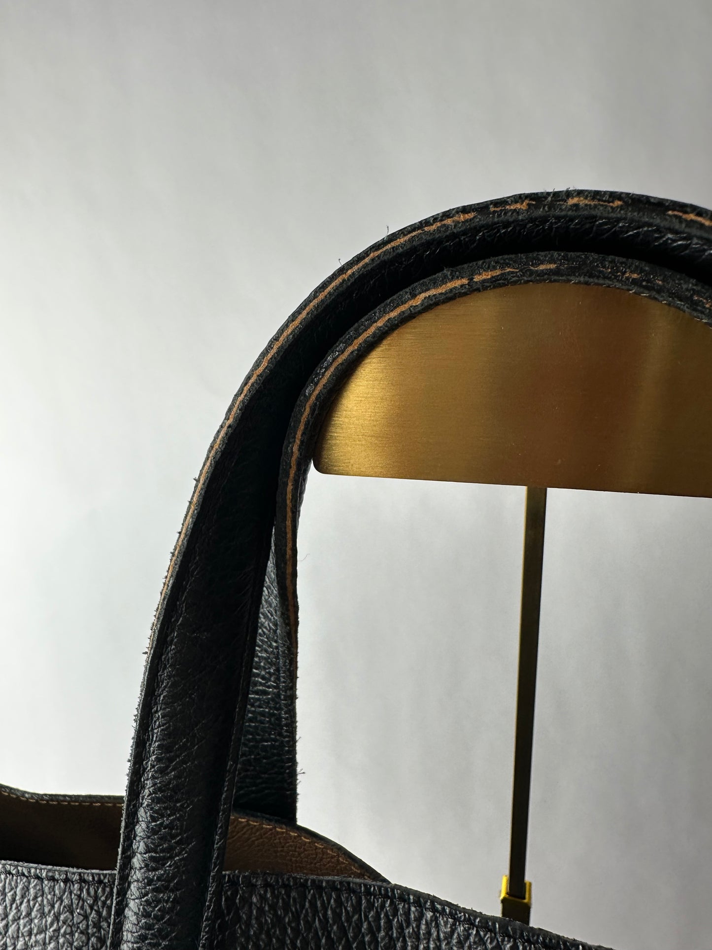 PIERRE HERME bag in black grained cowhide with openwork leaf motifs