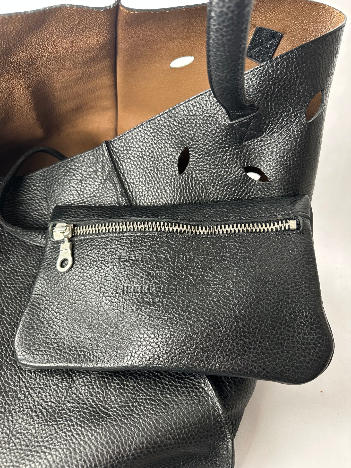 PIERRE HERME bag in black grained cowhide with openwork leaf motifs