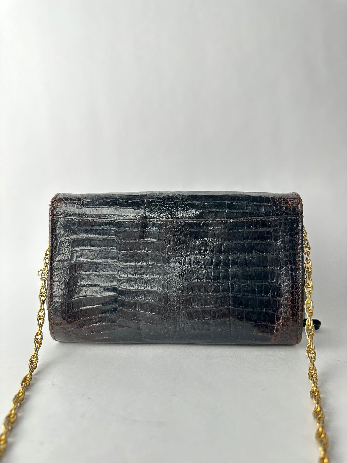 CHARLES JOURDAN chocolate exotic-style leather clutch bag with chain