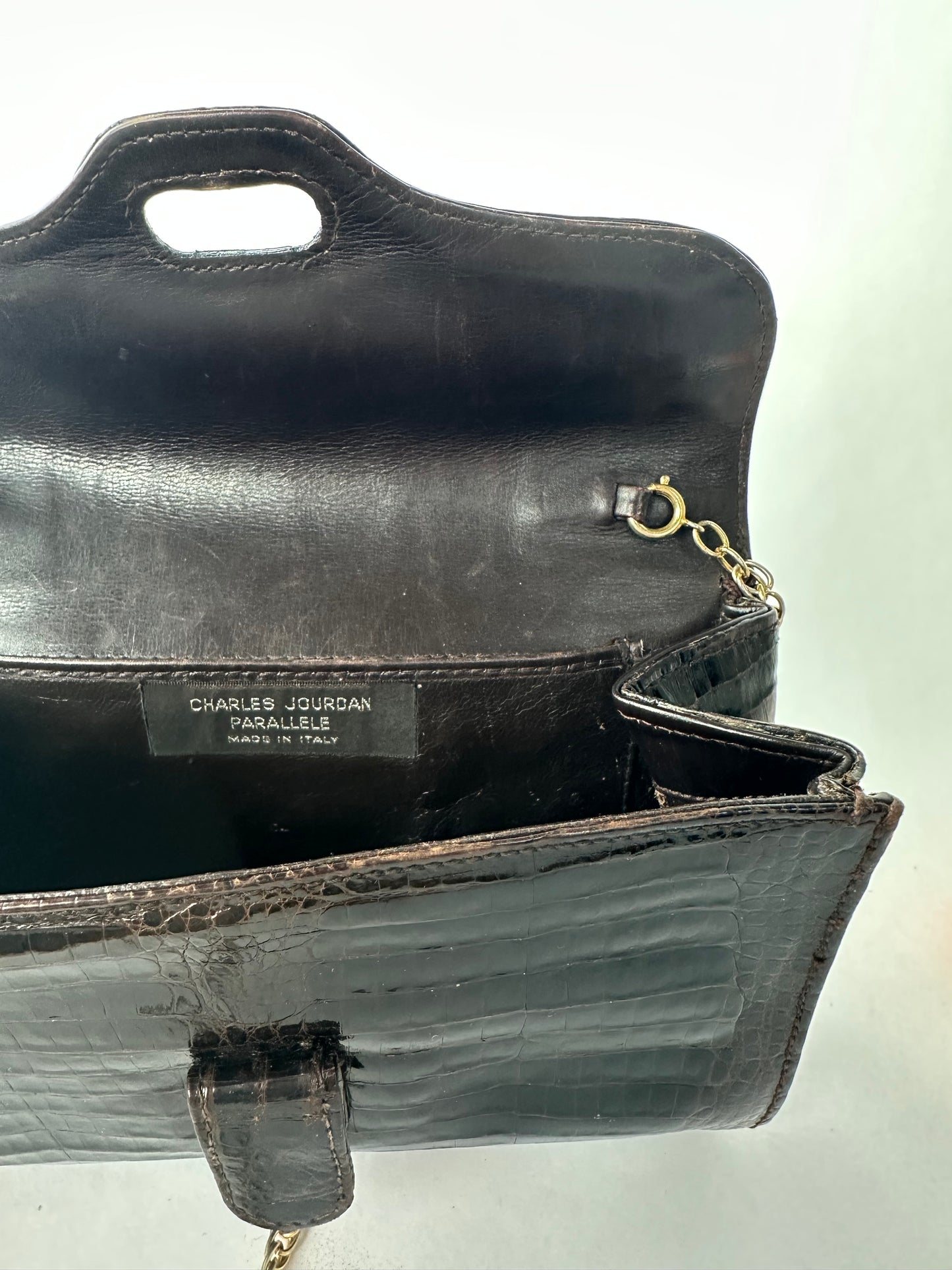 CHARLES JOURDAN chocolate exotic-style leather clutch bag with chain