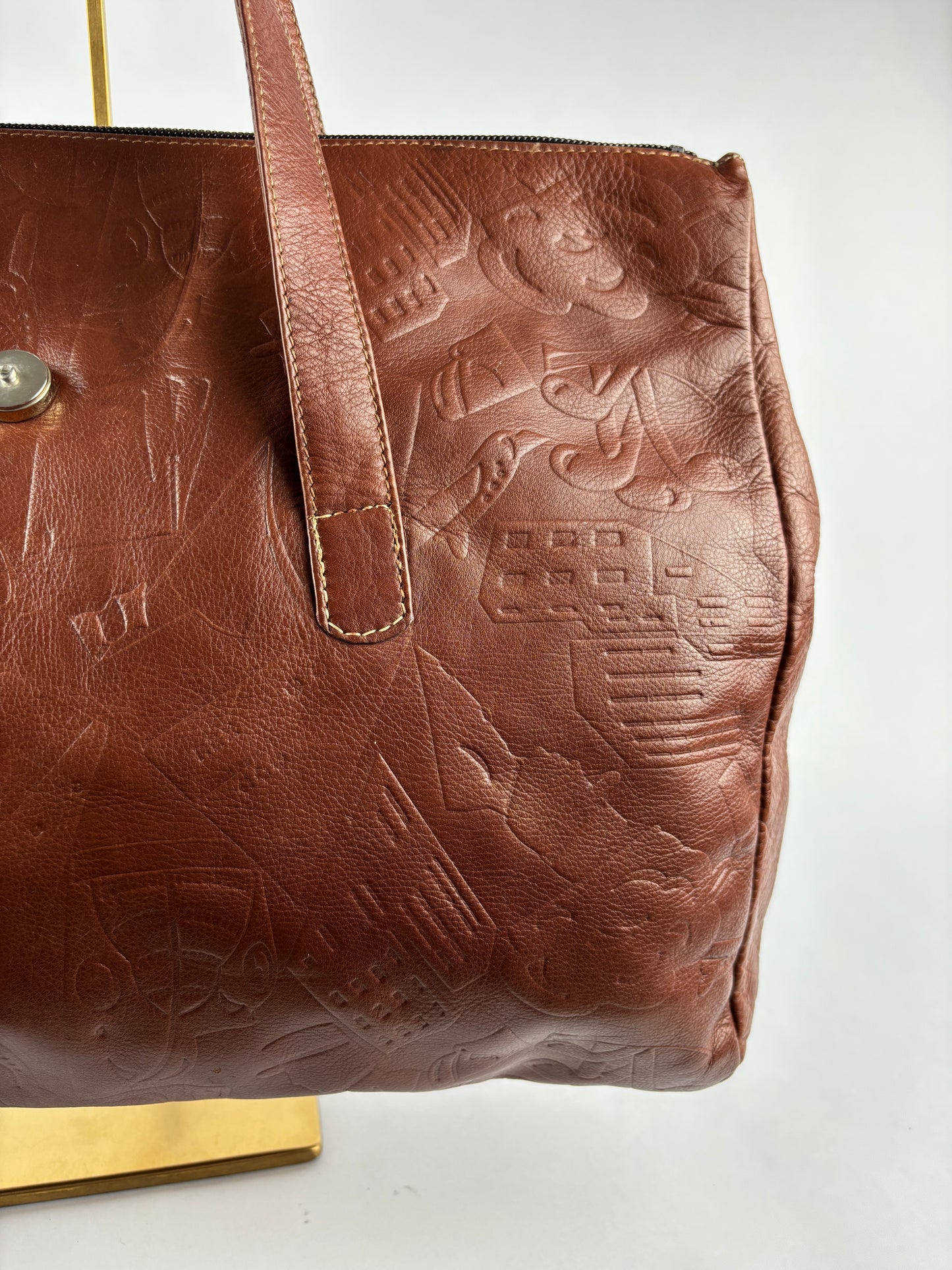 PRADA 1970 bag in cognac leather stamped with gold clubs