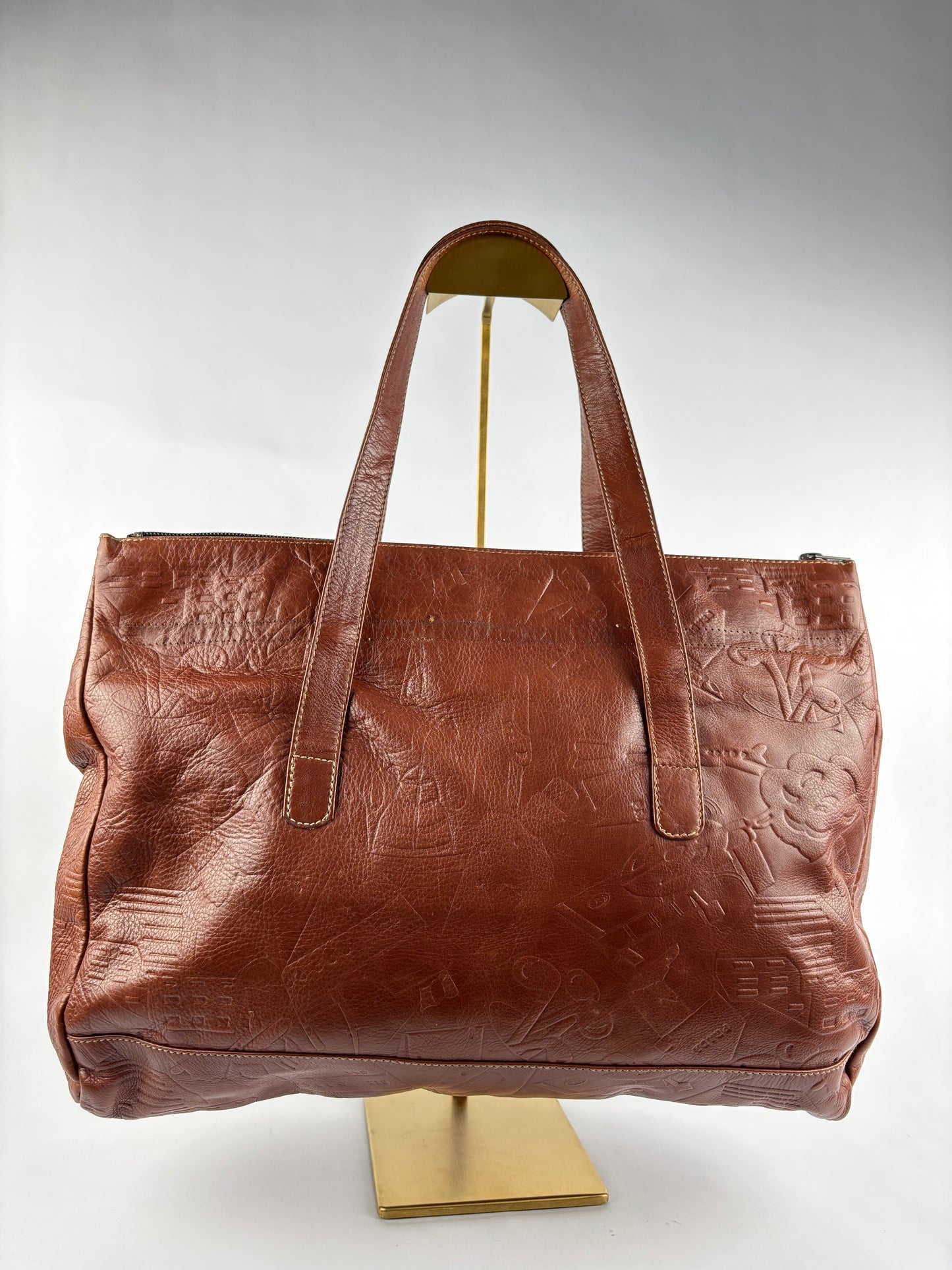 PRADA 1970 bag in cognac leather stamped with gold clubs