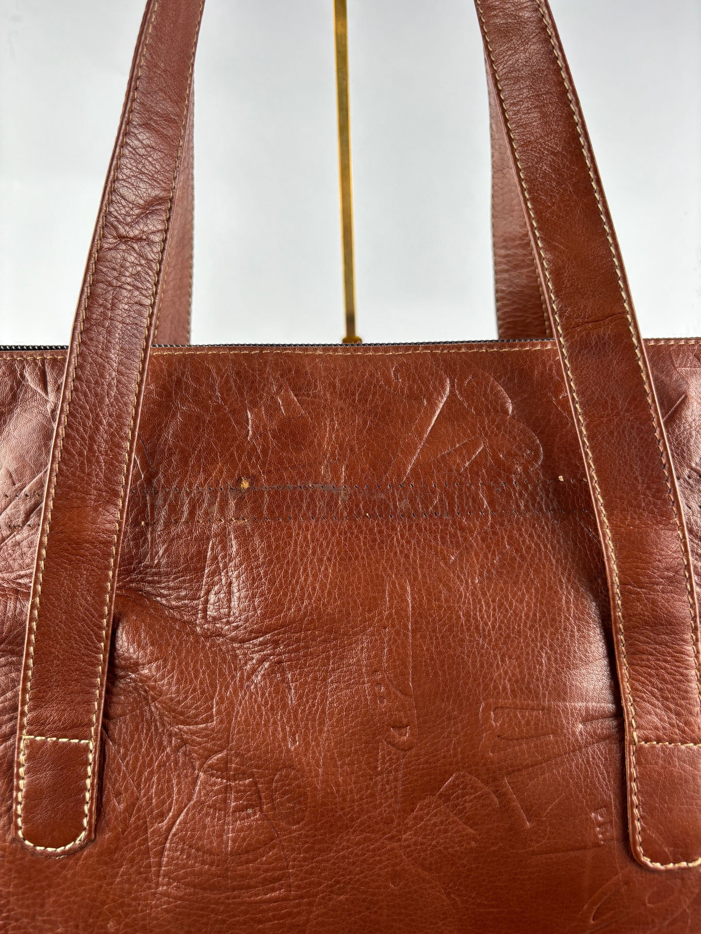 PRADA 1970 bag in cognac leather stamped with gold clubs