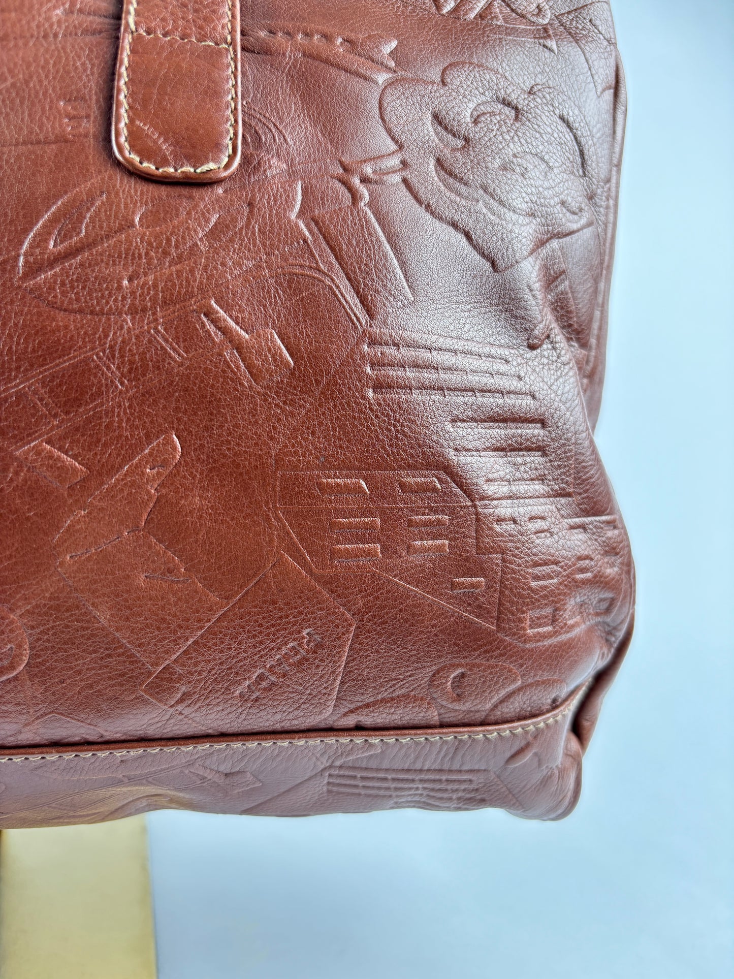 PRADA 1970 bag in cognac leather stamped with gold clubs