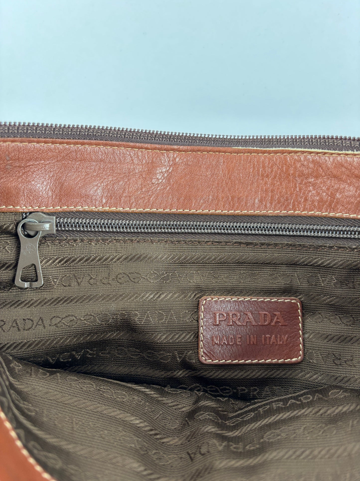 PRADA 1970 bag in cognac leather stamped with gold clubs