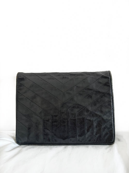 YSL black leather clutch