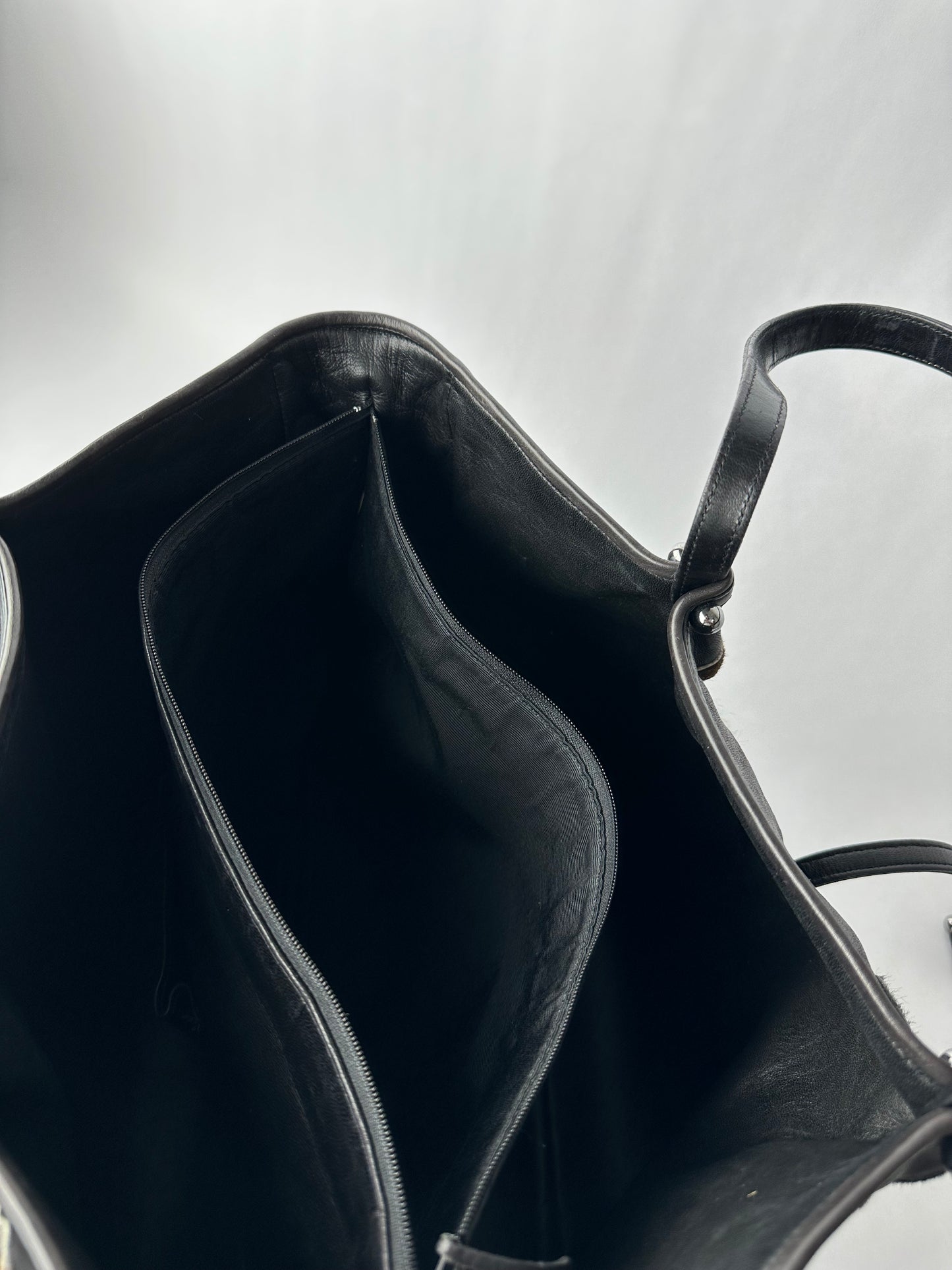 RENAUD PELLEGRINO leather tote bag with fur shape cutouts