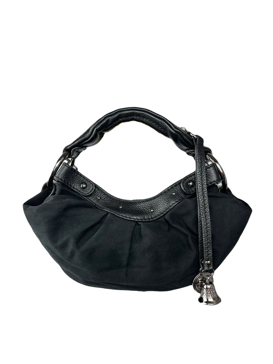 LANCEL small bag in cotton canvas and black grained leather decorated with a bell bag jewel and a signed coin, zipped handle.