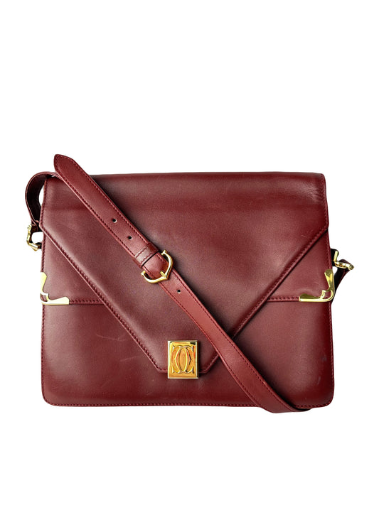 CARTIER Burgundy leather bag with gold details